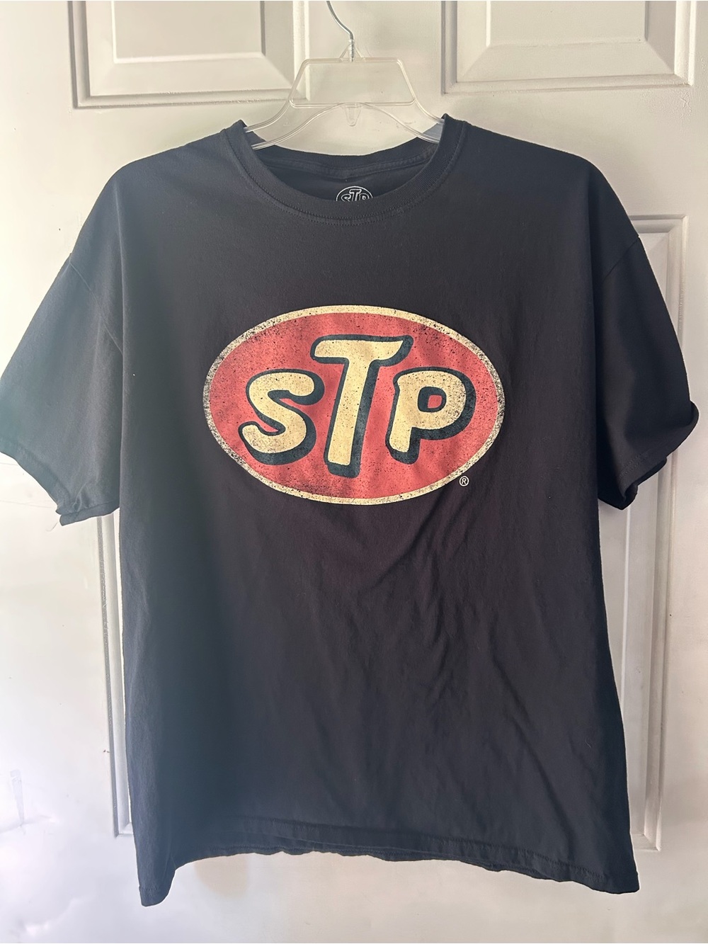 Black STP cotton t-shirt with red oval logo, size XL #racing #automotive